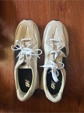 New Balance Cream and Black Low-Top Sneakers